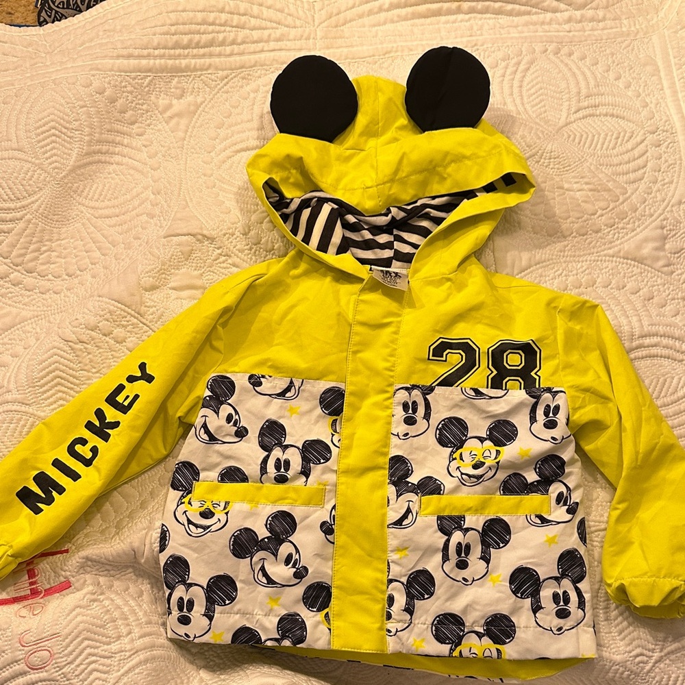 Disney Parks Yellow Mickey Mouse Hooded rain Jacket with carrying compartment